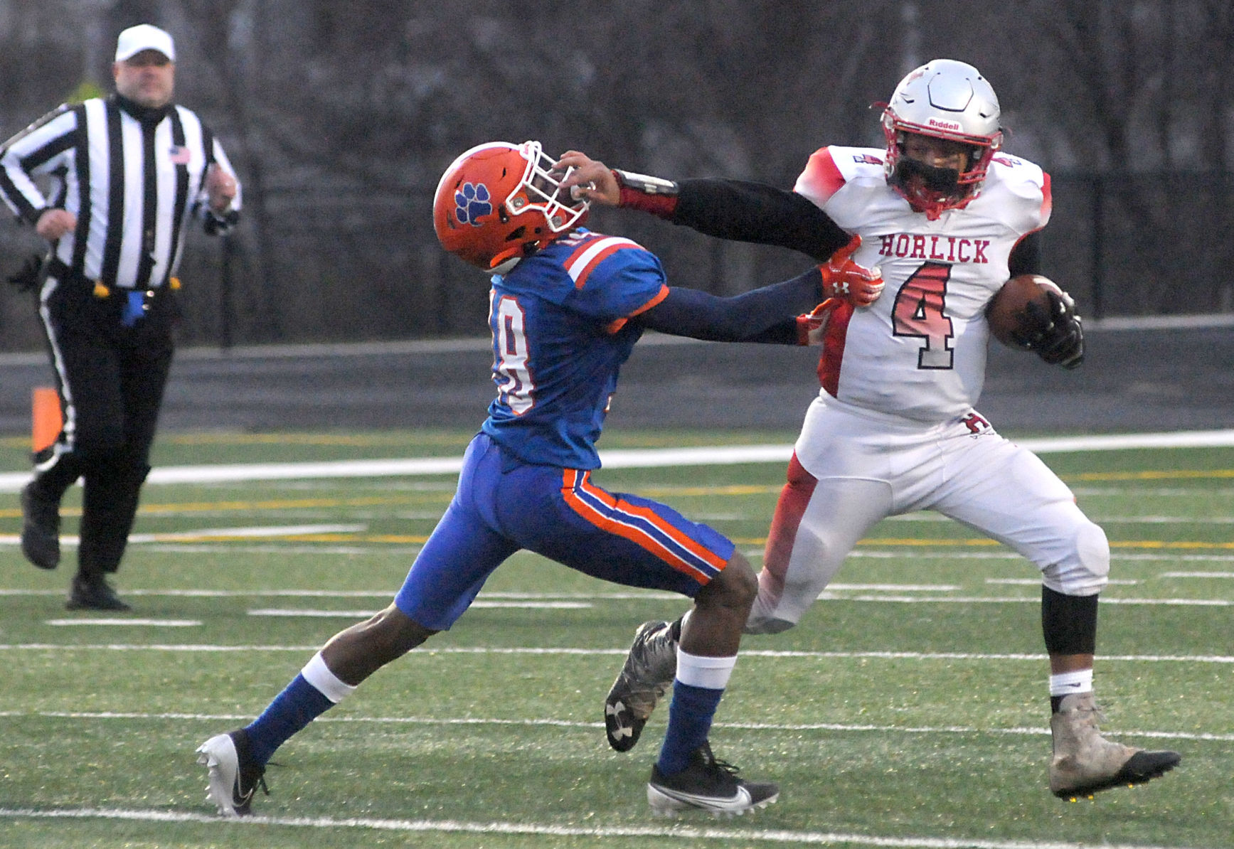 Giving a stiff-arm